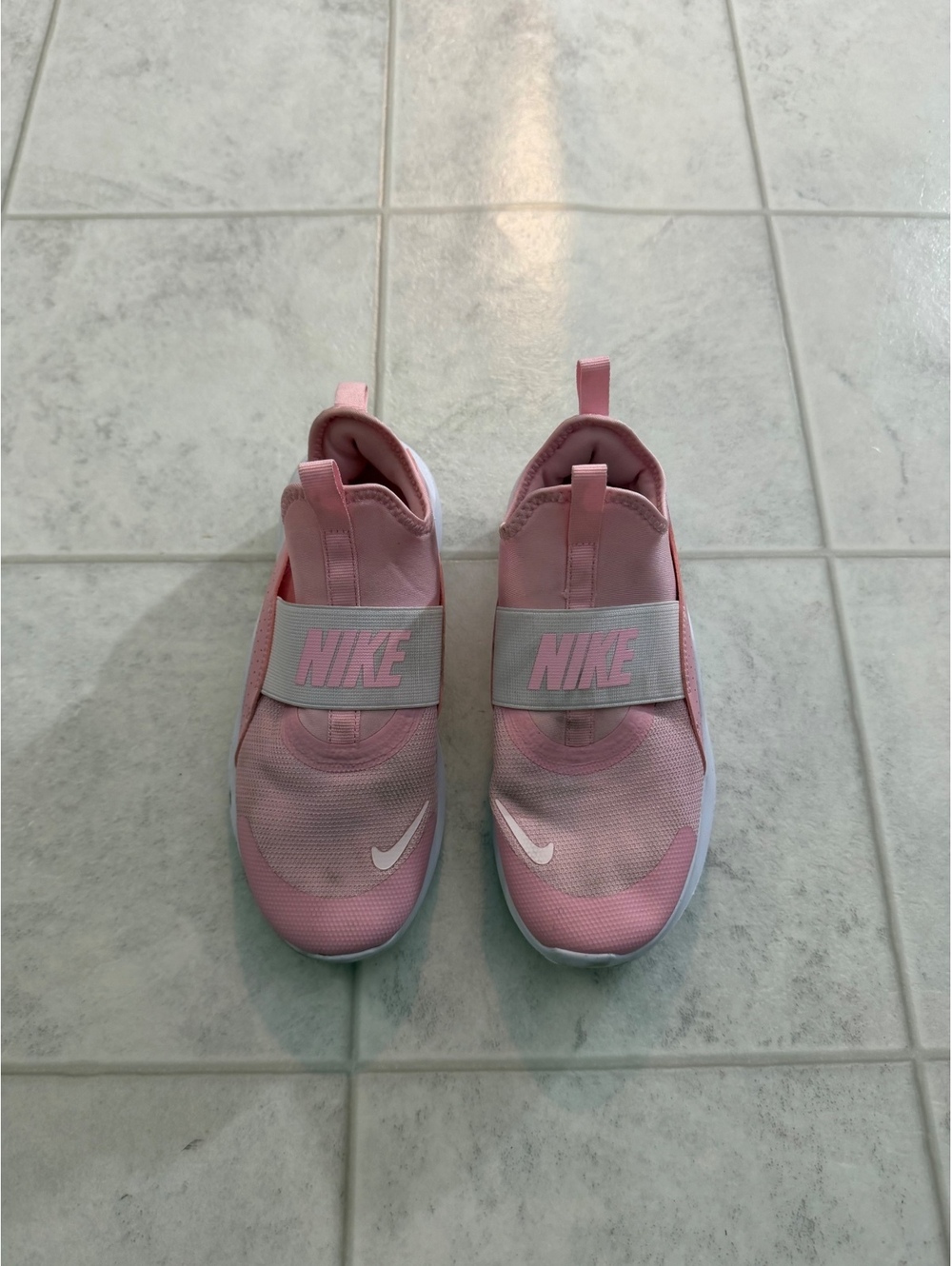 Nike pink slip on sneakers